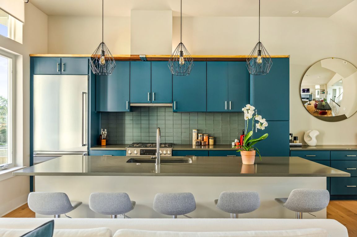 2300 Enfield Road, Unit 302 Austin, TX 78703 - Photo 6 of 26 a kitchen with a refrigerator a sink and cabinets