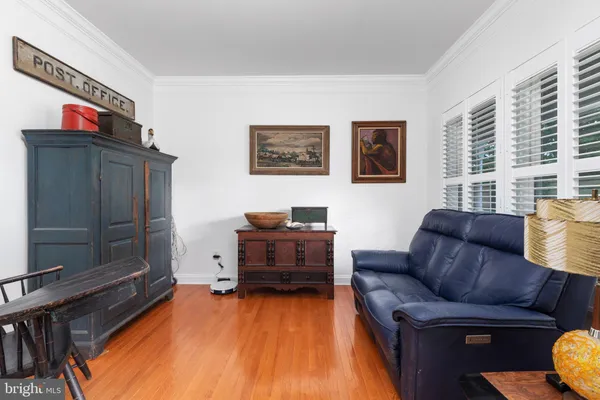 a view of a dining room with furniture and window