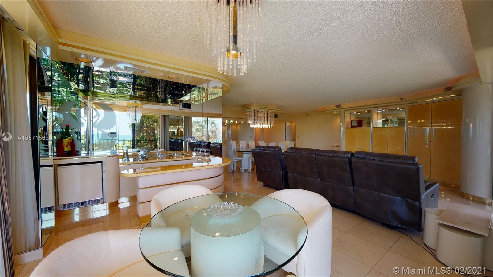 Normandy Beach Surfside, FL 33154 - Photo 14 of 18 a living room with a large window and furniture