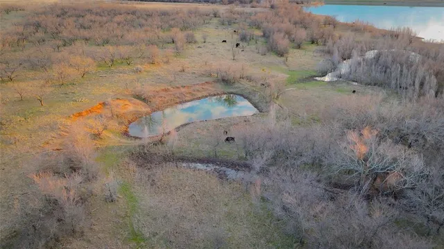 a view of a lake with a house