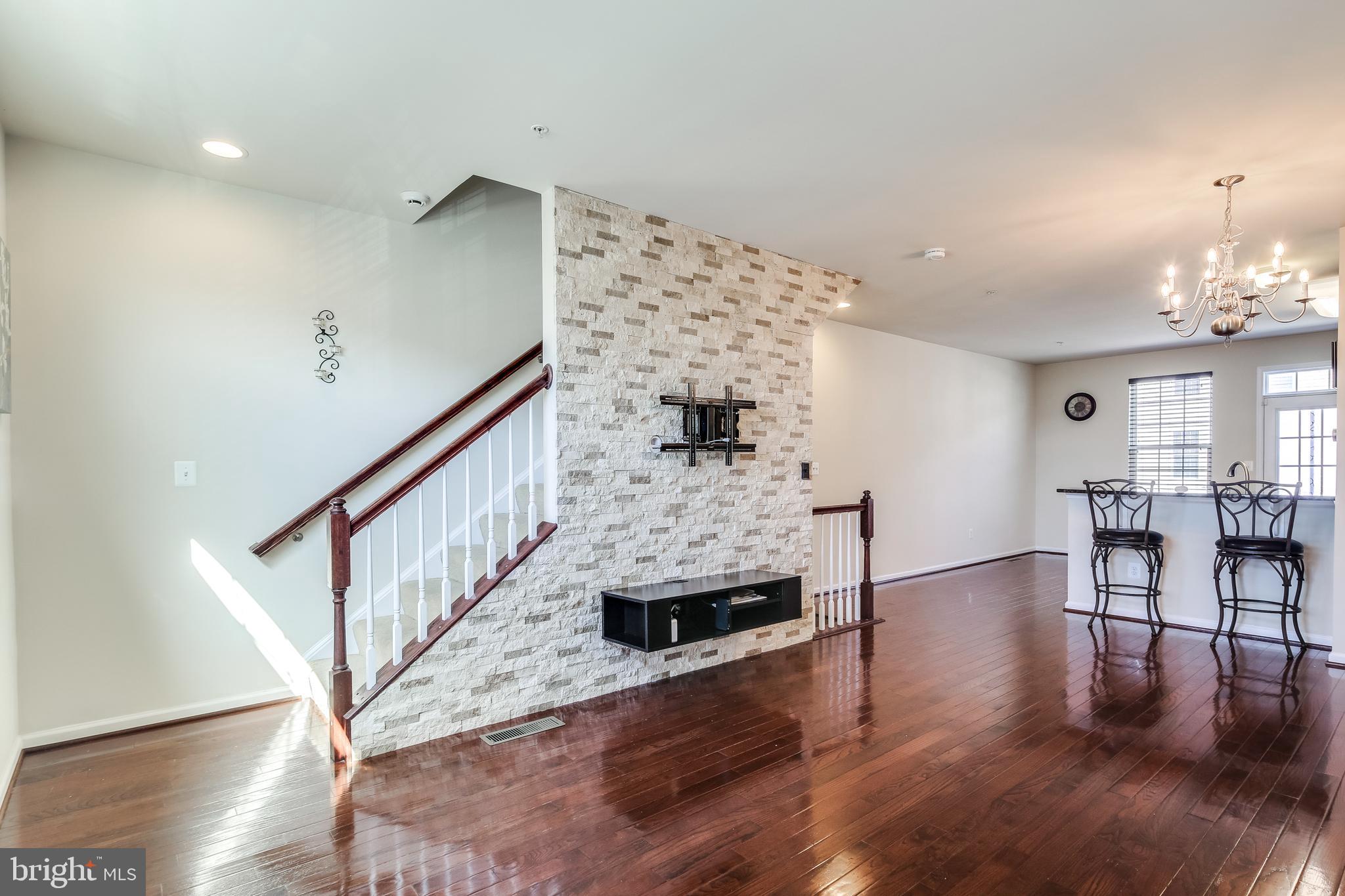 7227 Abbey Road Elkridge, MD 21075 - Photo 10 of 32 FLOATING SHELF UNIT AND TV MOUNT CONVEY