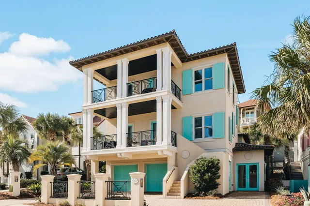 a front view of a building with a yard