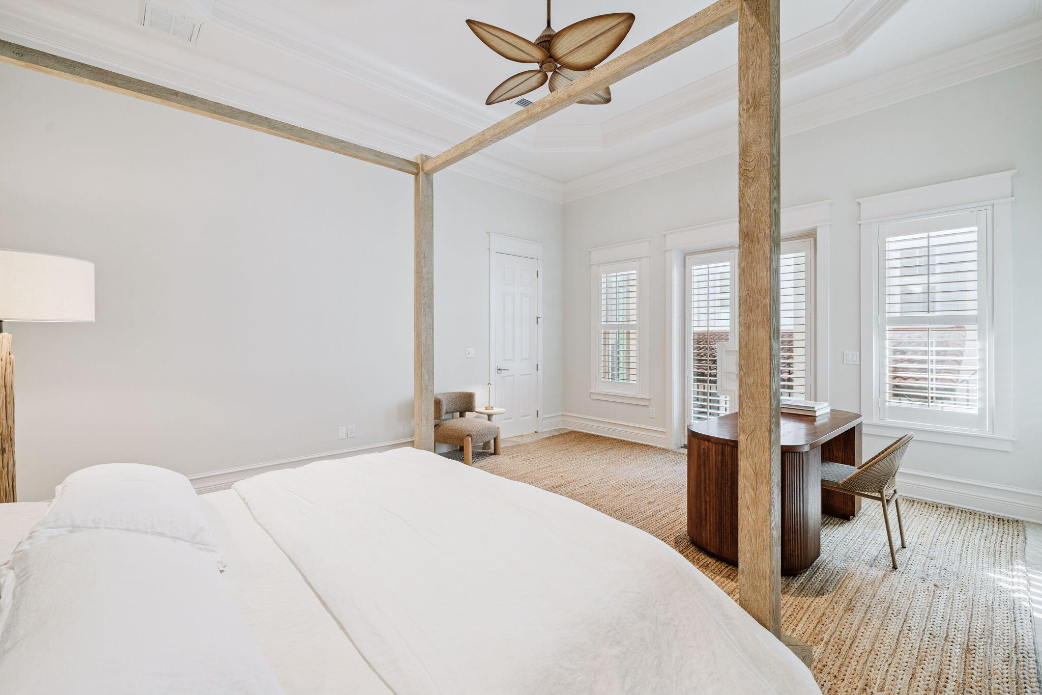 358 Rue Caribe Miramar Beach, FL 32550 - Photo 23 of 65 a spacious bedroom with a bed and a table in it