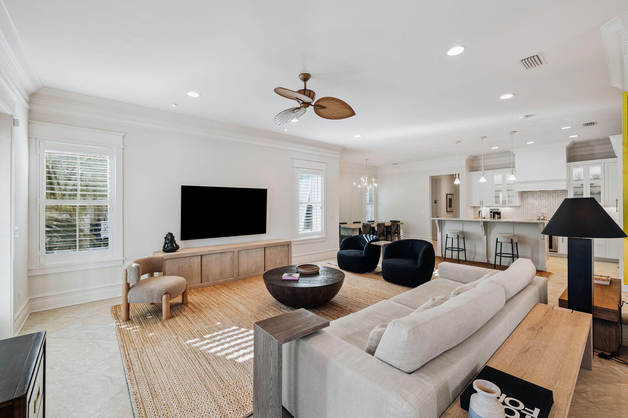 358 Rue Caribe Miramar Beach, FL 32550 - Photo 4 of 65 a living room with furniture a flat screen tv and a large window