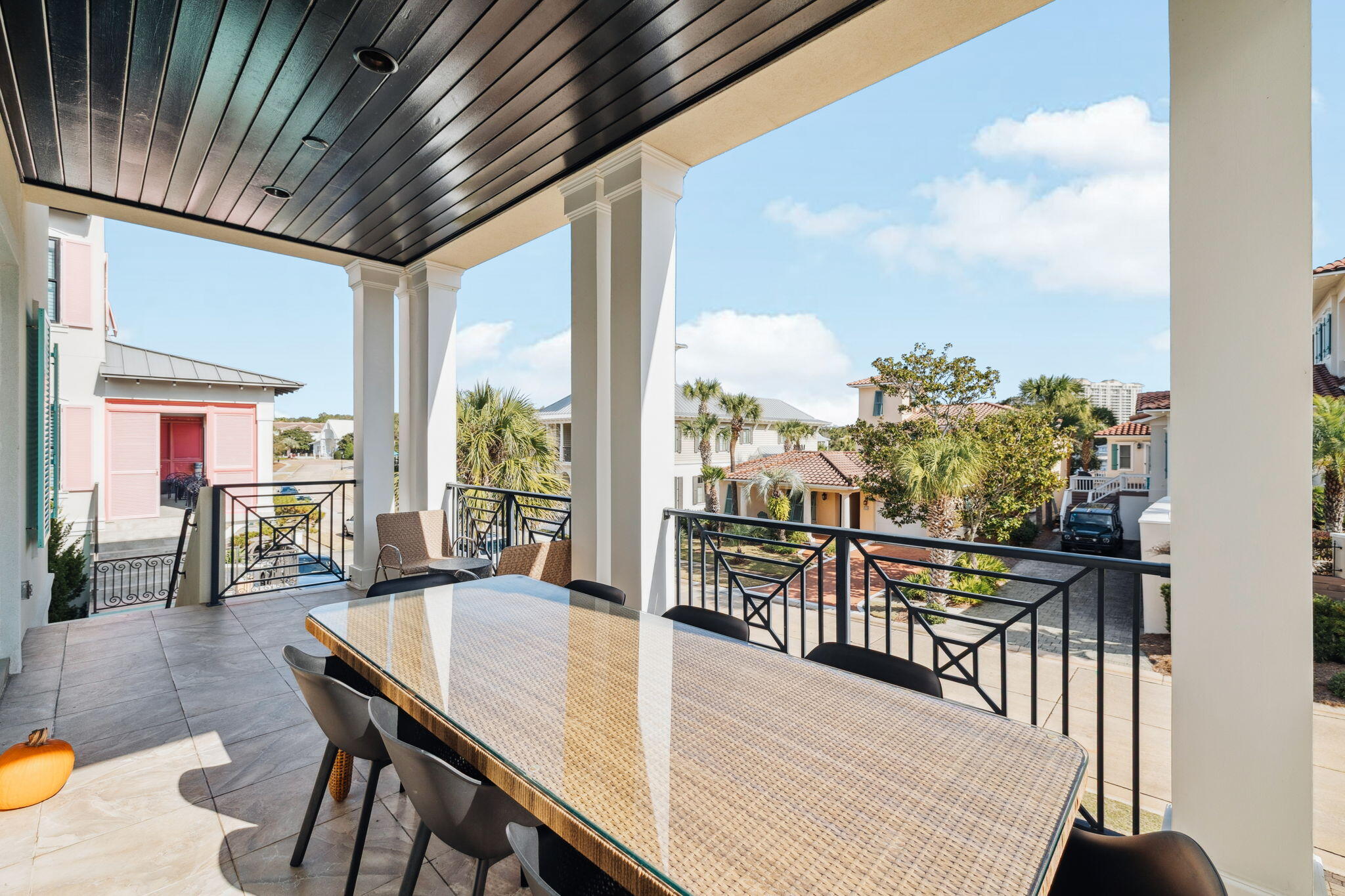 358 Rue Caribe Miramar Beach, FL 32550 - Photo 60 of 65 a view of a chairs and table in patio