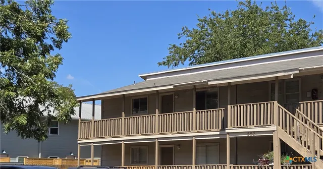a view of a house with a large window