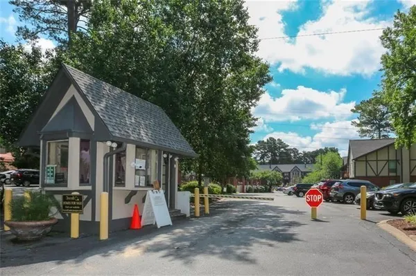 a view of street with parked cars