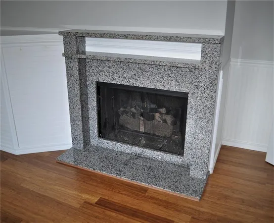 a living room with a fireplace