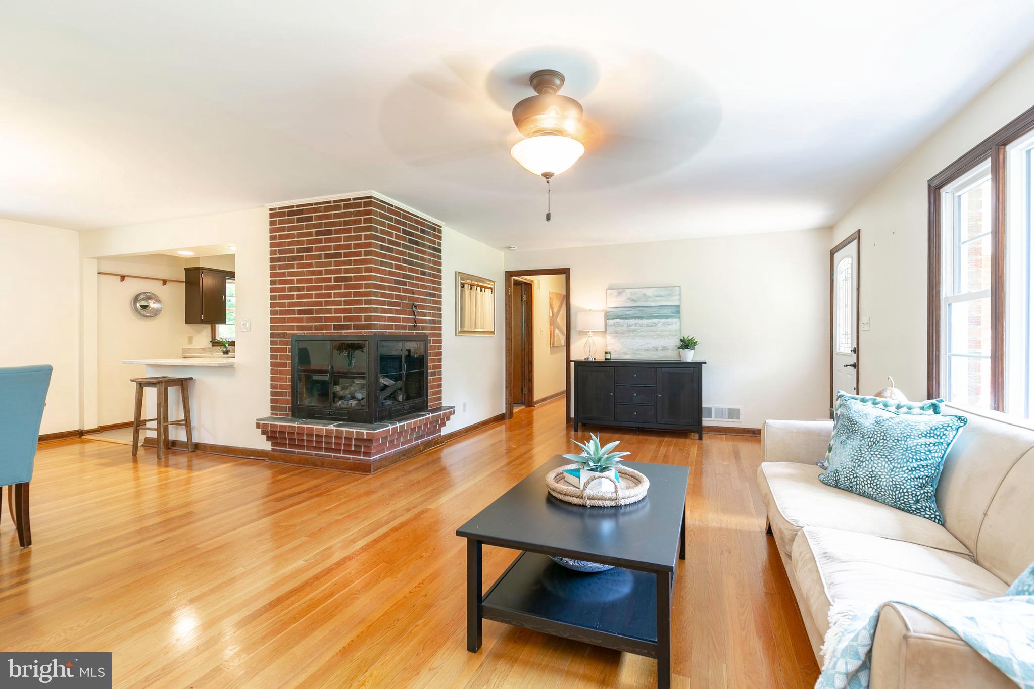 1448 Grandview Road Arnold, MD 21012 - Photo 5 of 56 living/dining area with fireplace