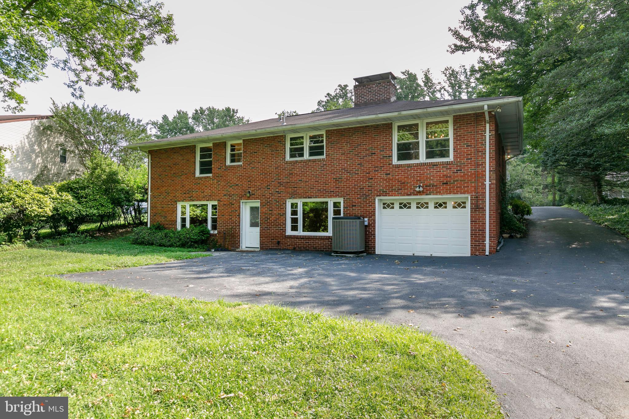1448 Grandview Road Arnold, MD 21012 - Photo 43 of 56 Exterior view of the back of the house and garage