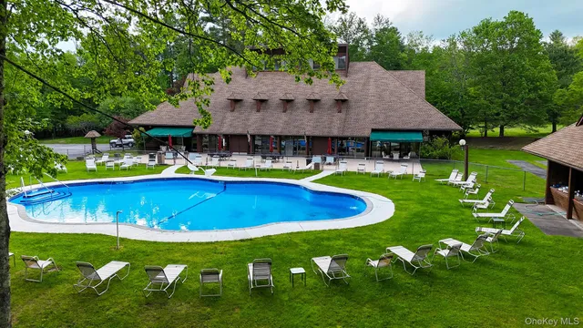 a view of a street with a building in the background