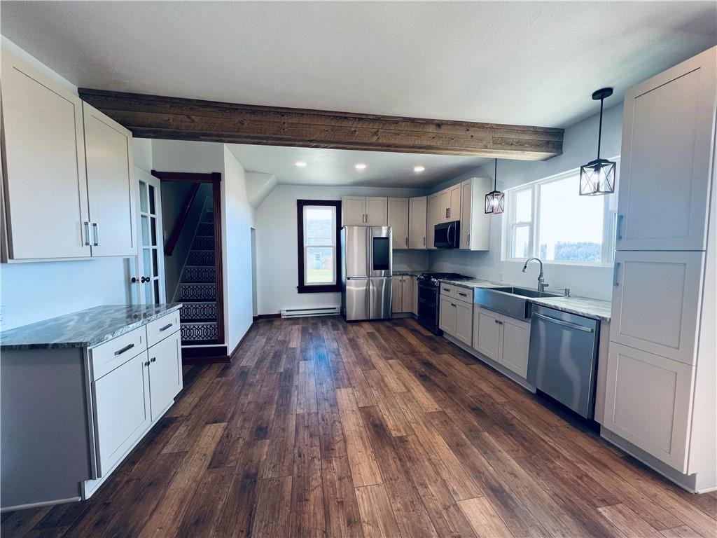 133 Weston Road Grove City, PA 16127 - Photo 33 of 44 This kitchen is unreal. Every angle is beautiful and thoughtfully laid out.