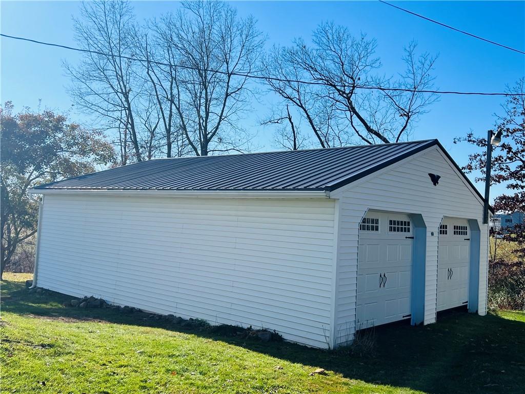 133 Weston Road Grove City, PA 16127 - Photo 44 of 44 Detached large 2 stall garage. Brand new roof, siding and doors.