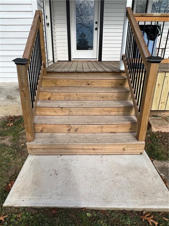 133 Weston Road Grove City, PA 16127 - Photo 6 of 44 Brand new steps on back porch. Leads into laundry room and kitchen area.