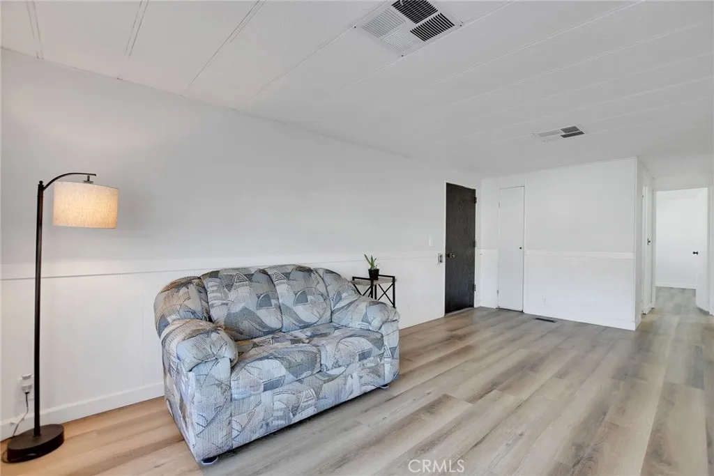 840 Foothill, Unit 27 Azusa, CA 91702 - Photo 5 of 30 a living room with furniture and a ceiling fan