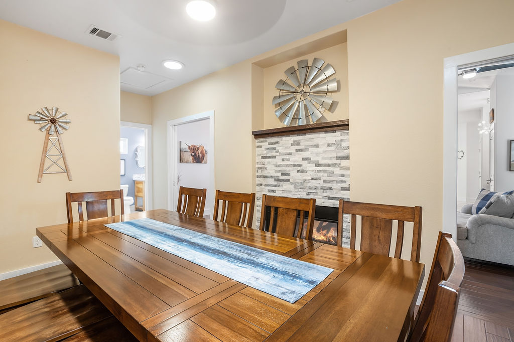 13326 Trautwein Road Austin, TX 78737 - Photo 16 of 38 Dining space with wood finished floors, baseboards, and recessed lighting