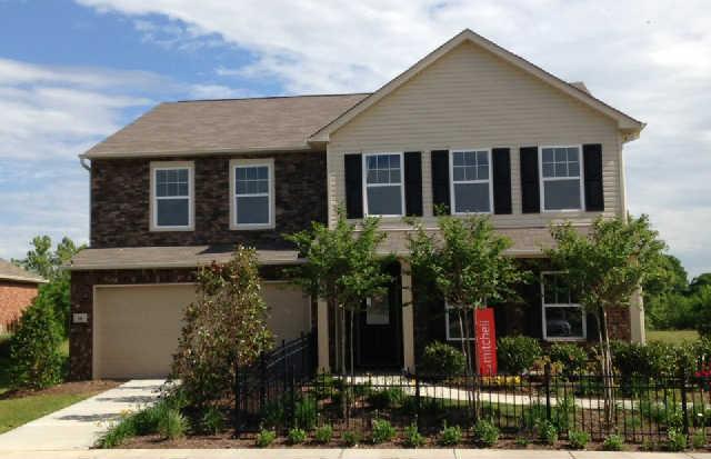 1419 Old Stone Road, Unit 704 Lebanon, TN 37087 - Photo 6 of 22 front view of a house with potted plants