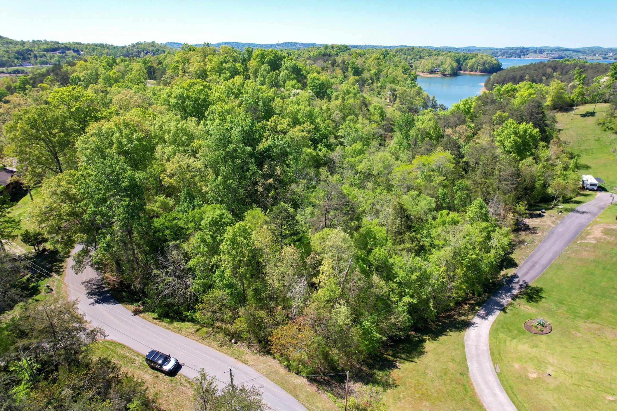 13 Pleasure Road Sevierville, TN 37876 - Photo 2 of 20 a view of a lake from a balcony