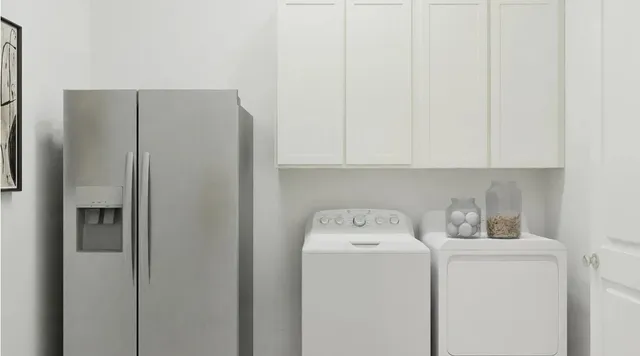 a view of a dining room with furniture and window