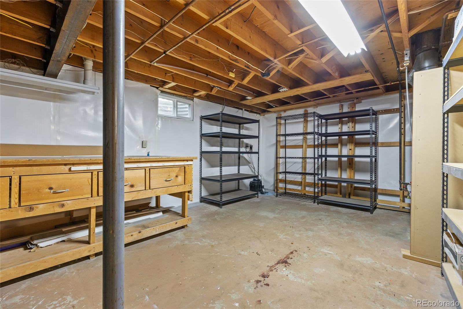 1131 Birdie Road Broomfield, CO 80020 - Photo 30 of 43 a view of a room with gym equipment
