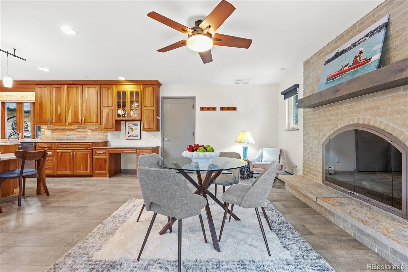 1131 Birdie Road Broomfield, CO 80020 - Photo 10 of 43 a view of a dining room with furniture window and wooden floor