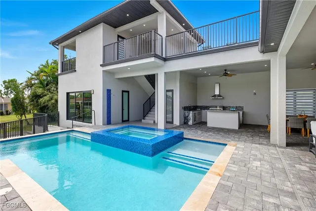 a view of a balcony with wooden fence and floor