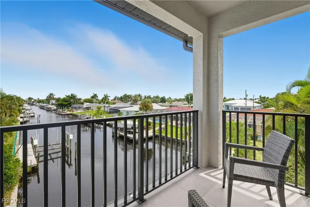 a kitchen with a dining table chairs counter space and appliances