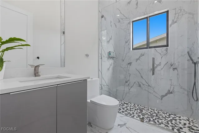 a view of a patio with a table and chairs