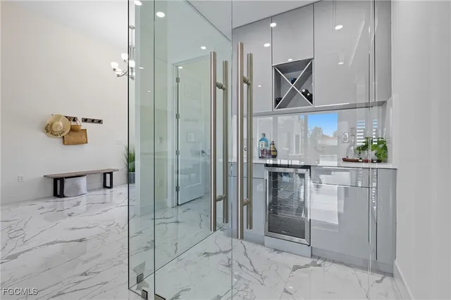 a view of a livingroom with furniture and a window