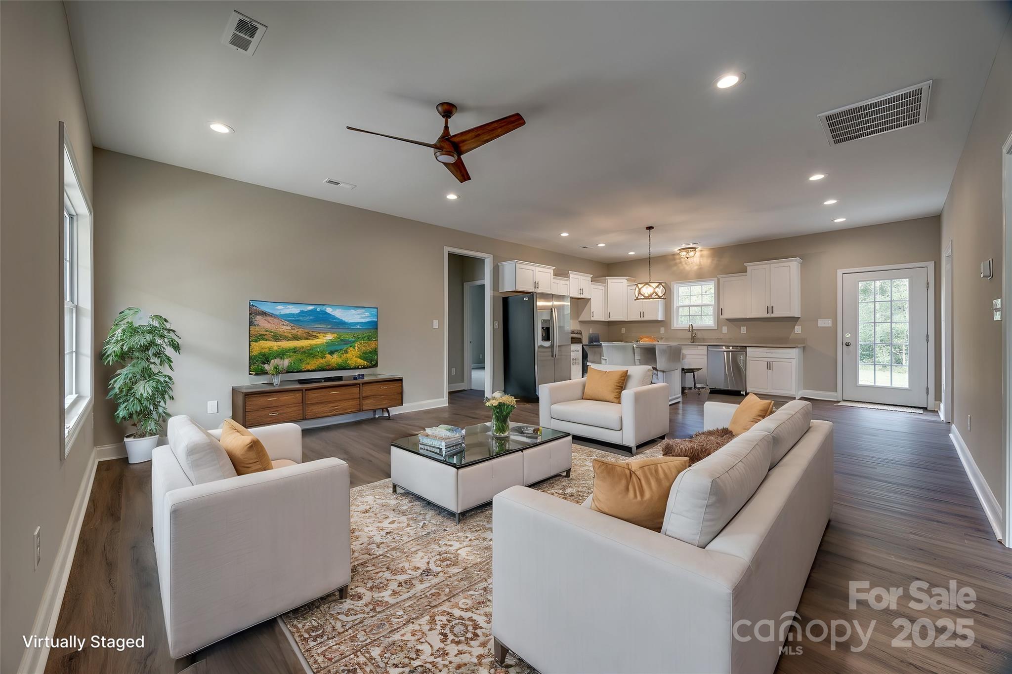 1960 Powell Avenue Lancaster, SC 29720 - Photo 2 of 13 a living room with furniture and a flat screen tv