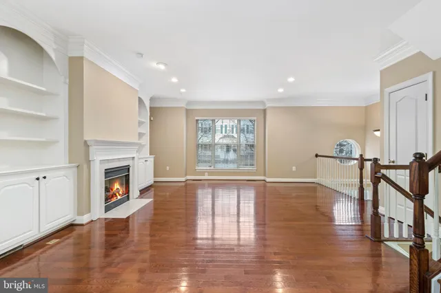 a view of kitchen with furniture and wooden floor