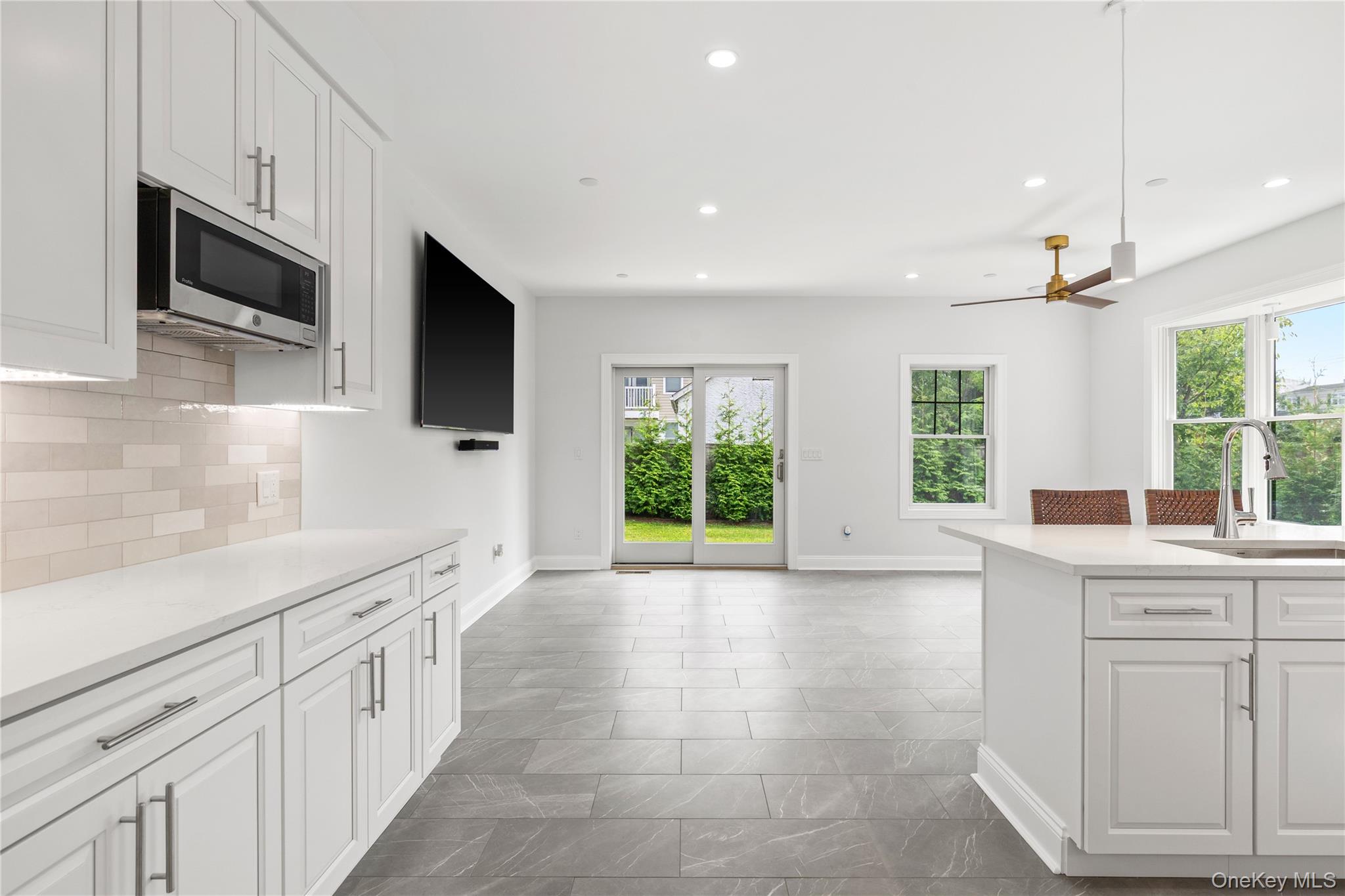 535 2nd Street, Unit DUPLEX R Mamaroneck, NY 10543 - Photo 7 of 32 The Kitchen opens into a coveted family room.