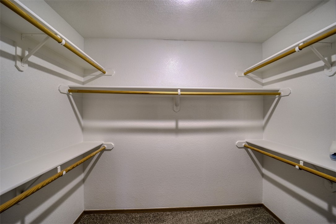 2213 Jamie Road Fort Mohave, AZ 86426 - Photo 16 of 51 Walk in closet featuring carpet flooring