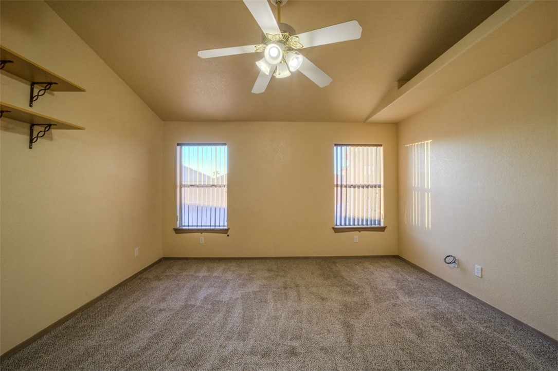 2213 Jamie Road Fort Mohave, AZ 86426 - Photo 25 of 51 Carpeted spare room featuring ceiling fan