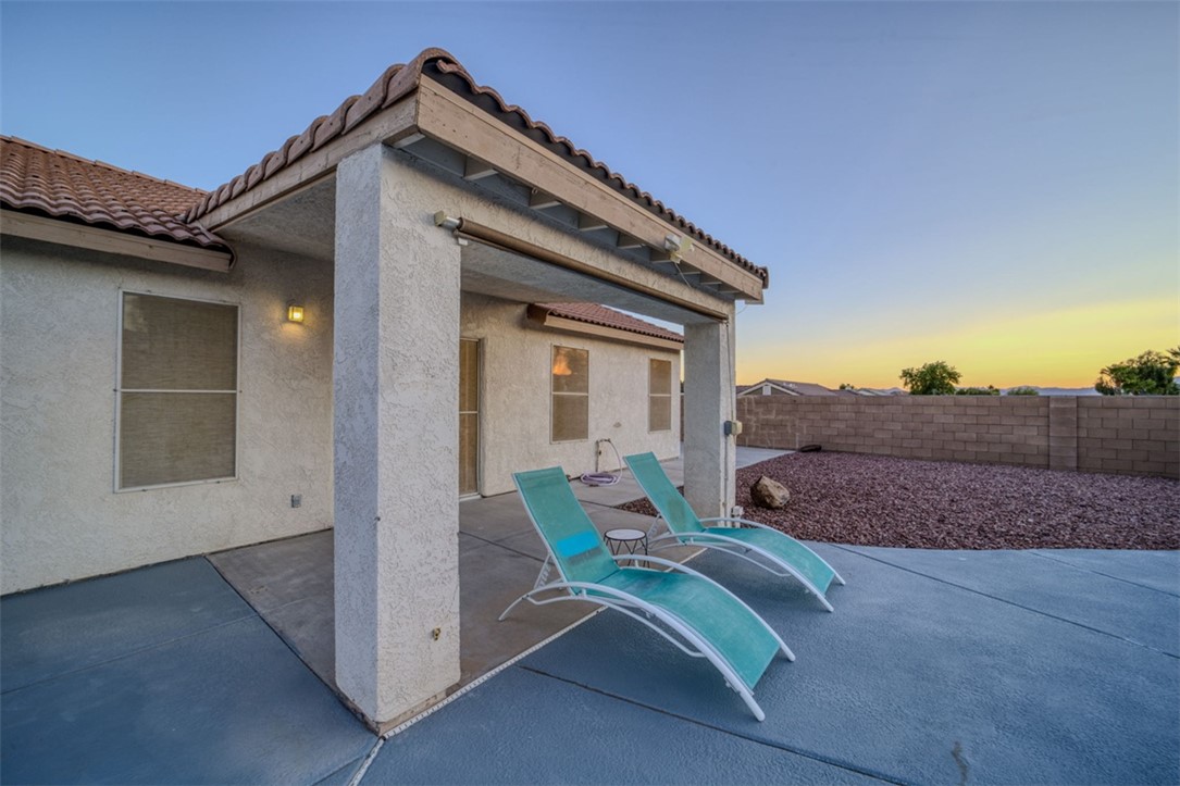 2213 Jamie Road Fort Mohave, AZ 86426 - Photo 31 of 51 Fenced backyard featuring a patio area