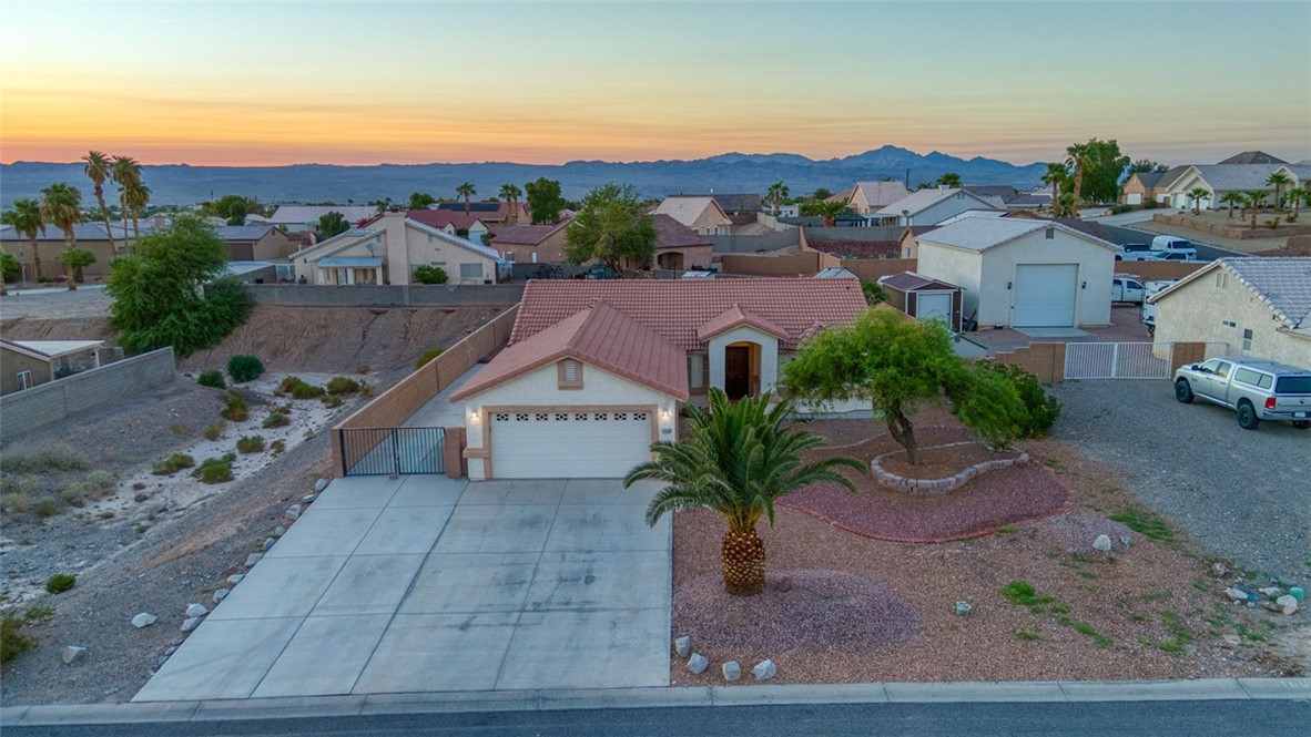 2213 Jamie Road Fort Mohave, AZ 86426 - Photo 50 of 51 Aerial view at dusk of a residential view