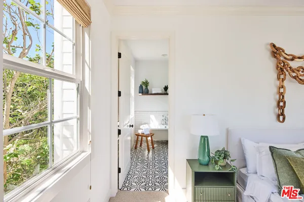 a view of balcony with furniture