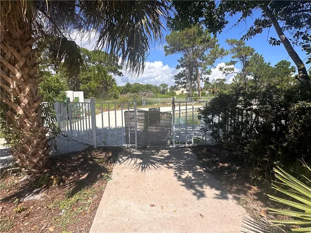 a view of a porch with wooden floor and outdoor space