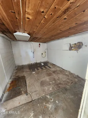 a view of a garage room with a sink