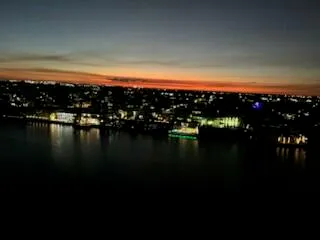 a view of a balcony with chair and table