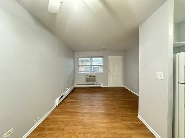 a view of an empty room and window