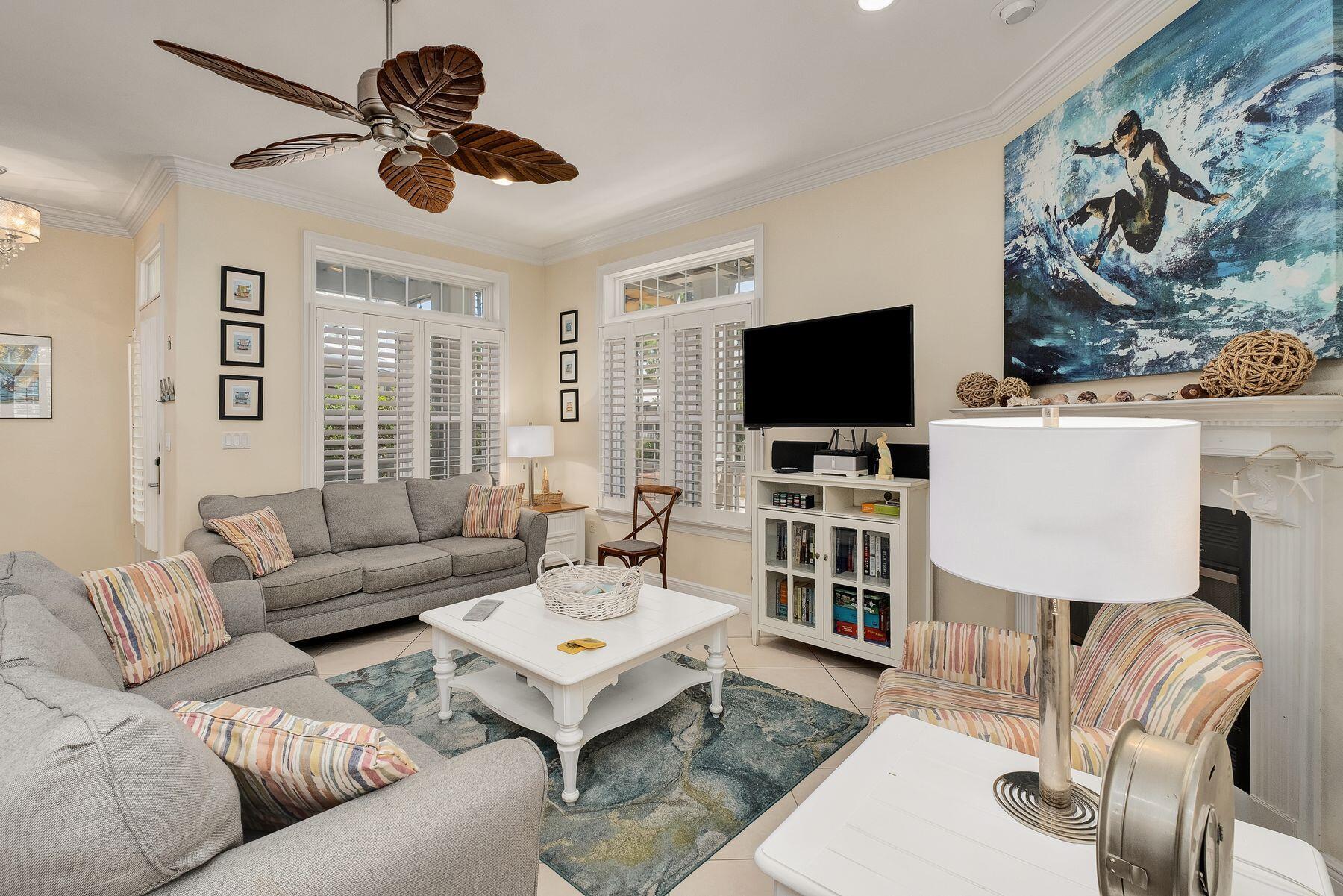 352 Cassine Garden Circle Santa Rosa Beach, FL 32459 - Photo 12 of 43 a living room with furniture and a flat screen tv