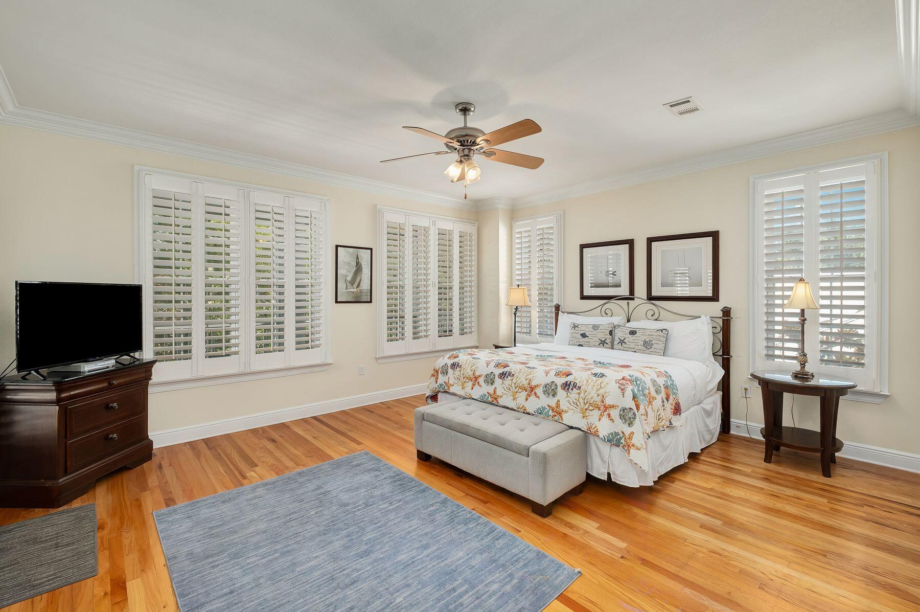352 Cassine Garden Circle Santa Rosa Beach, FL 32459 - Photo 19 of 43 a bedroom with a bed and a flat screen television