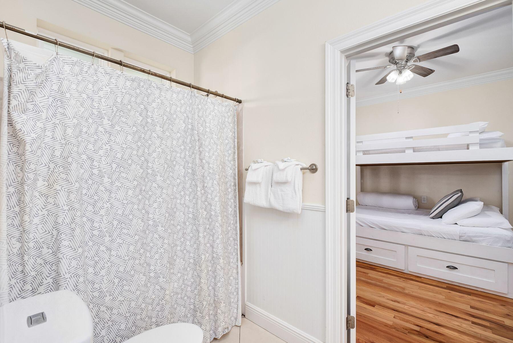 352 Cassine Garden Circle Santa Rosa Beach, FL 32459 - Photo 29 of 43 a bathroom with a shower curtain and a sink