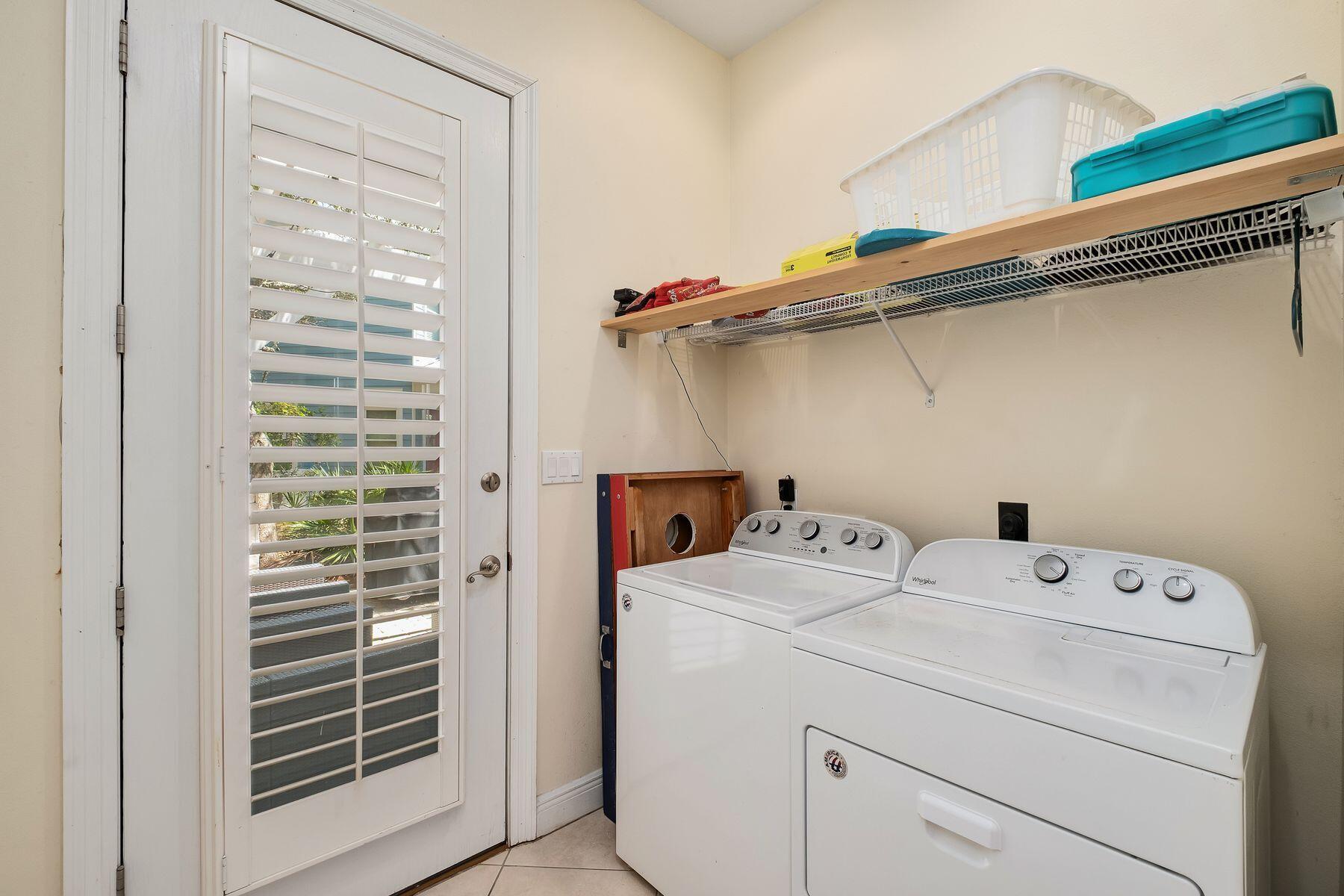 352 Cassine Garden Circle Santa Rosa Beach, FL 32459 - Photo 31 of 43 a utility room with dryer and washer