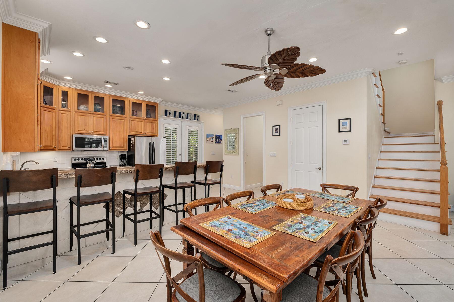 352 Cassine Garden Circle Santa Rosa Beach, FL 32459 - Photo 6 of 43 a dining room with a table and chairs