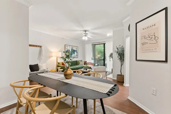 a bathroom with a tub sink and window