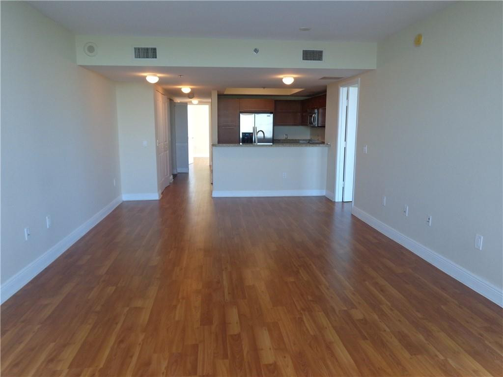 2641 North Flamingo Road, Unit 1201N Sunrise, FL 33323 - Photo 7 of 49 LIVING/DININGROOM TOWARD KITCHEN