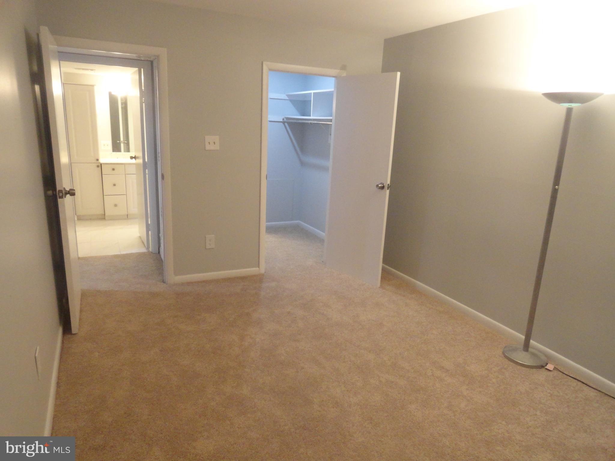 5804 Royal Ridge Drive, Unit K Springfield, VA 22152 - Photo 14 of 33 Master bedroom and walk in closet