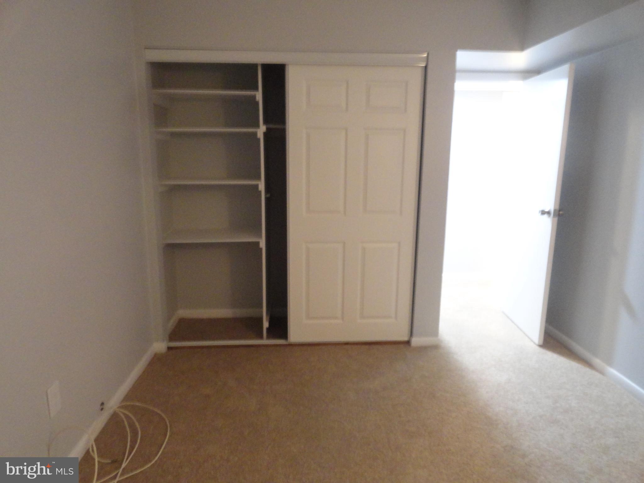 5804 Royal Ridge Drive, Unit K Springfield, VA 22152 - Photo 17 of 33 bedroom number two with custom shelves in closet